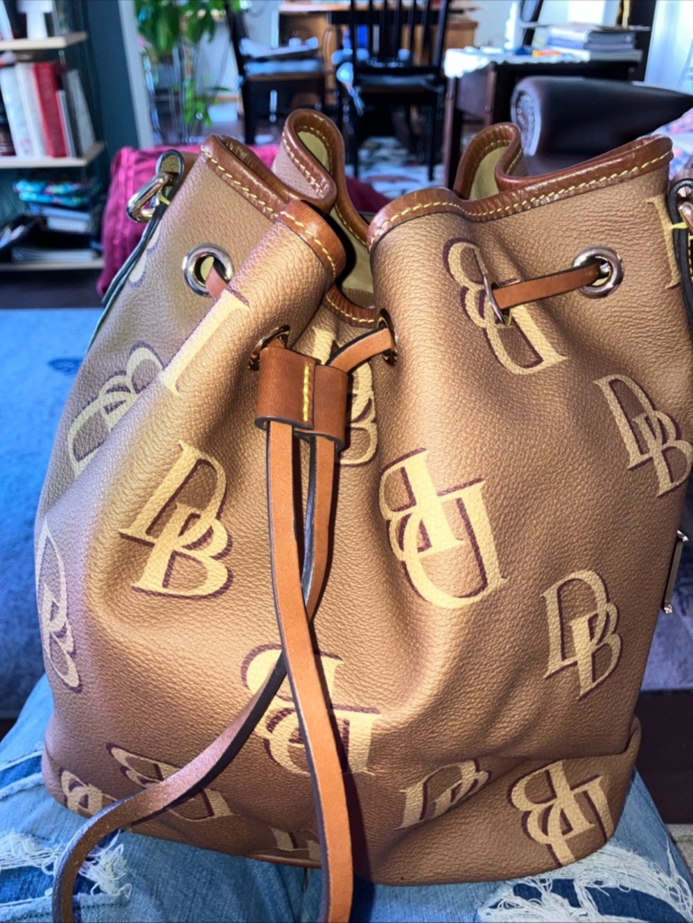 Dooney & Bourke Brown and Tan Logo Drawstring Bucket Bag